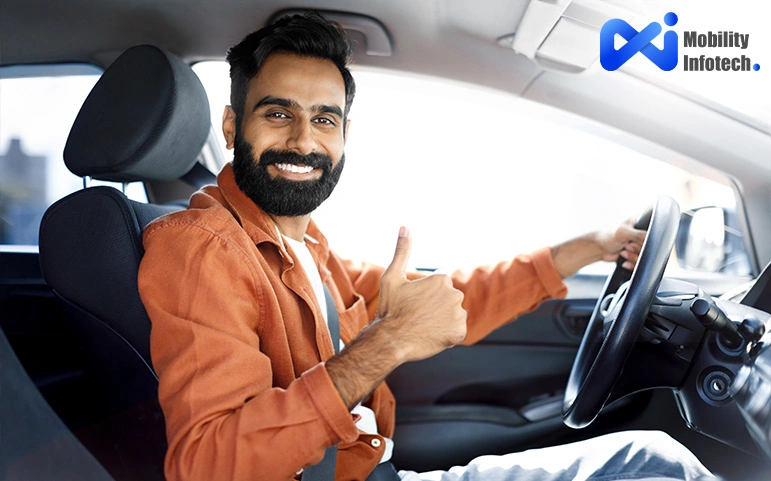 Smiling driver giving thumbs up inside a car