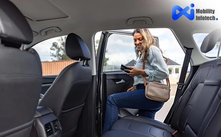 a woman sitting a car