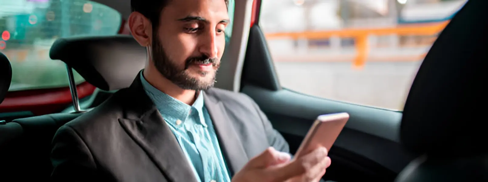 Employee using a branded white-label carpooling app for shared office commuting