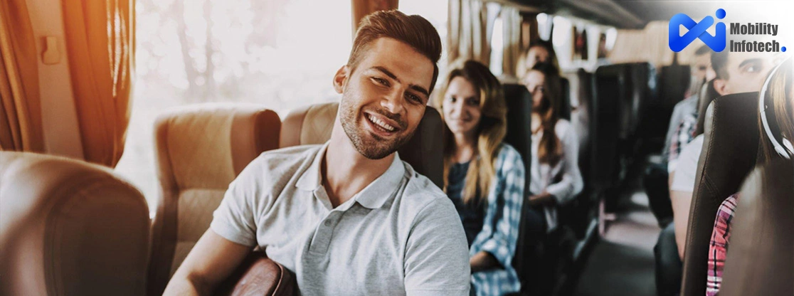 Smiling man on a bus with passengers