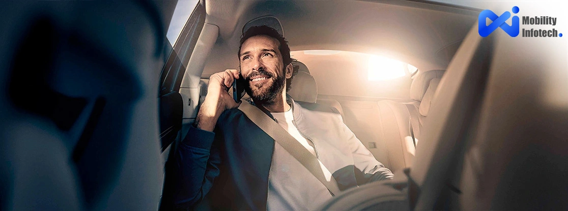 Professional chauffeur using digital limo booking system for client pickup in Belgium